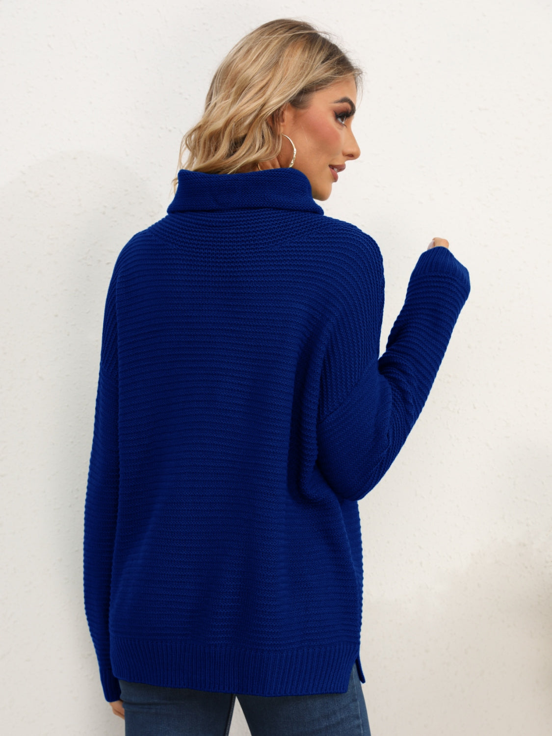 Dark Blue textured knit oversized turtleneck pullover sweater with ribbed details.
