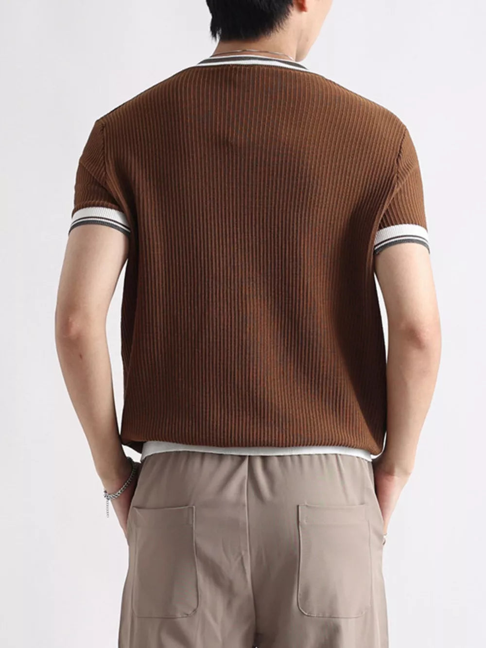 Brown ribbed crew neck t-shirt with white and gray striped trim on sleeves and neckline.