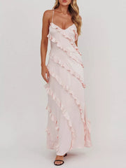 Blush pink ruffled spaghetti strap maxi dress with diagonal ruffle detailing.