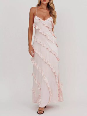 Blush pink ruffled spaghetti strap maxi dress with diagonal ruffle detailing.