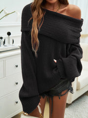 Black ribbed knit off-the-shoulder sweater with wide sleeves and a relaxed cocoon fit.
