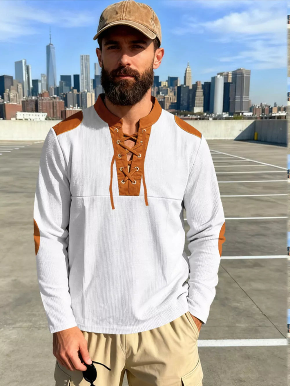 Men's white long-sleeve t-shirt with brown lace-up neckline and elbow patches.