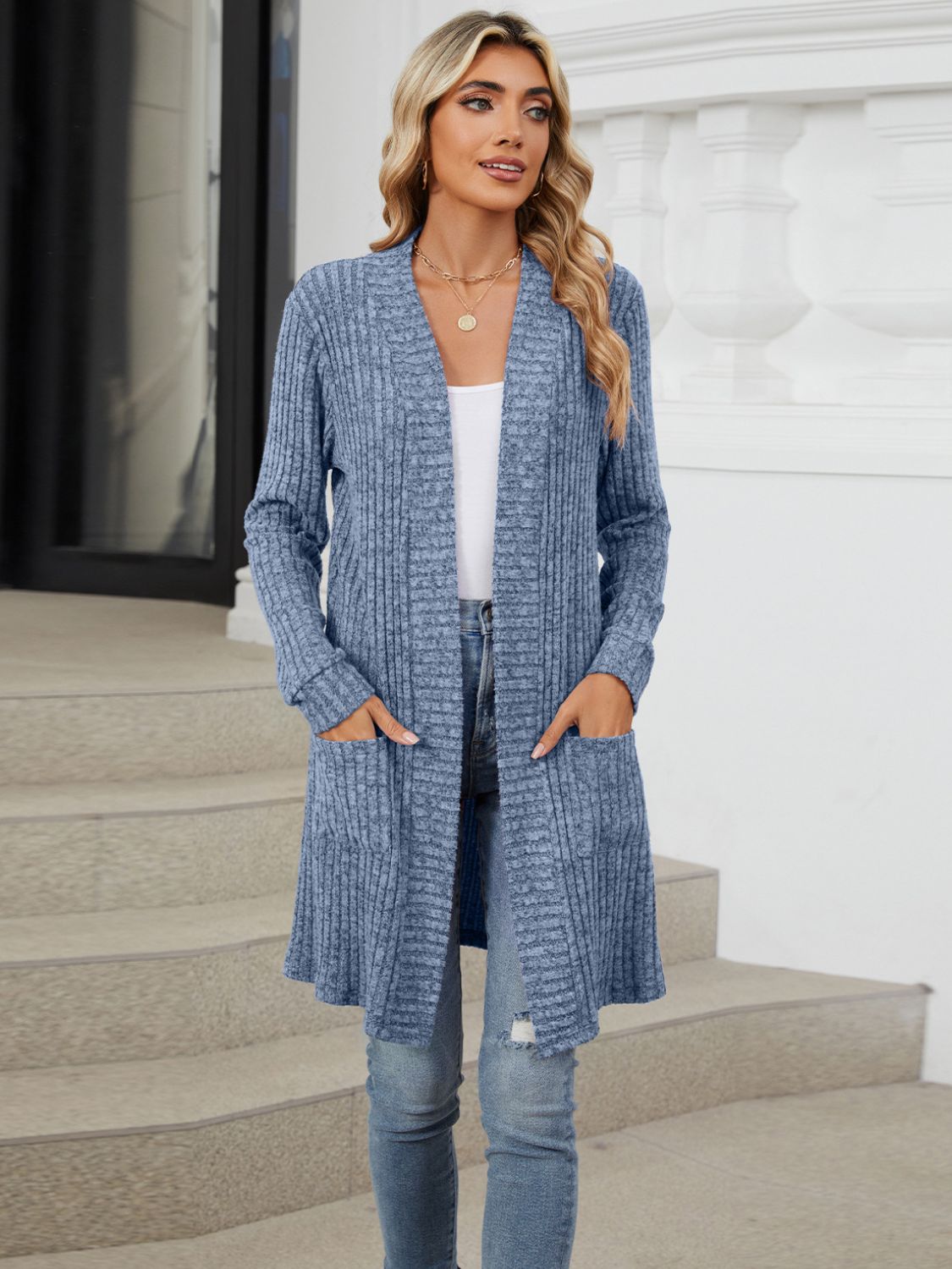 Dusty Blue textured ribbed knit duster cardigan with long sleeves and pockets.