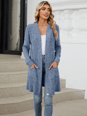 Dusty Blue textured ribbed knit duster cardigan with long sleeves and pockets.