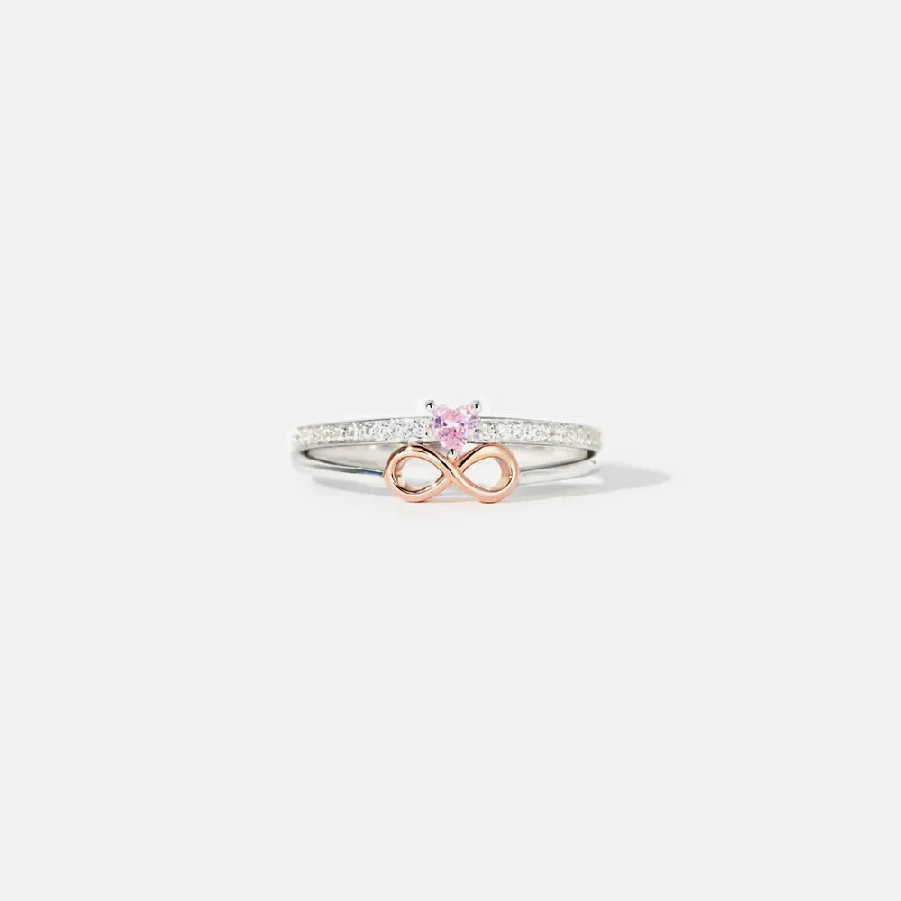 Silver infinity heart ring set with pink stone and pave band