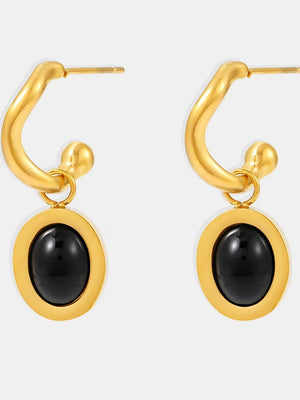 Sculptural hoop earrings with black agate insets, golden finish