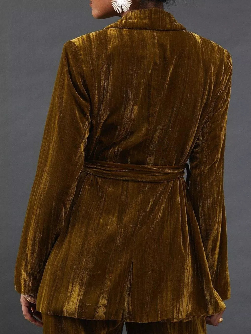 Belted velvet blazer in army green with a tie waist, shown from the back.