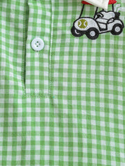 Gingham polo dress in Gum Leaf green cotton with a golf cart embroidery and white button detail.