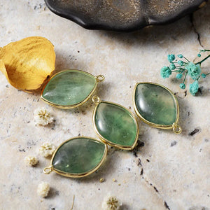 Cosmic Quartz Droplet Earrings in light green with gold-tone copper settings.