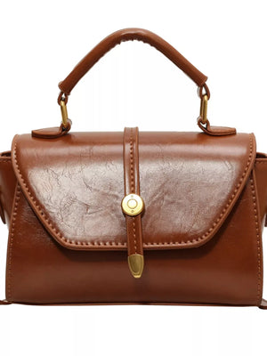 Brown mini pu leather crossbody bag with clasp and top handle