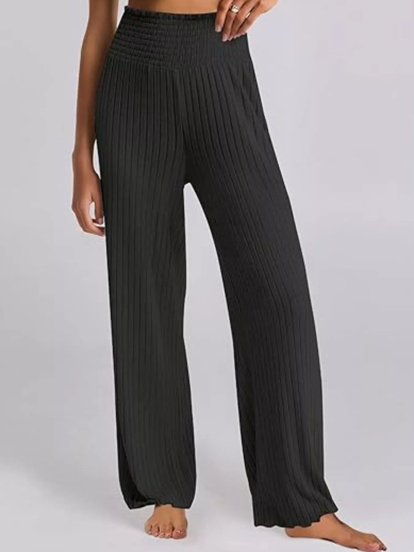 Black ribbed knit wide-leg lounge pants with smocked high waist