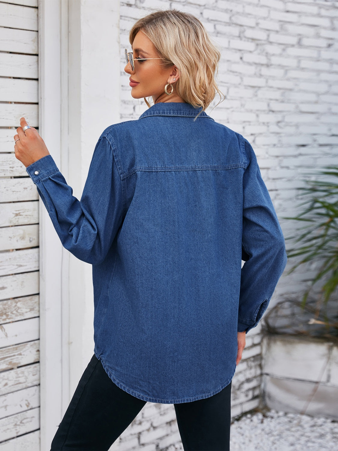 Oversized denim utility shirt in Dusty Blue with button-down front and long sleeves.