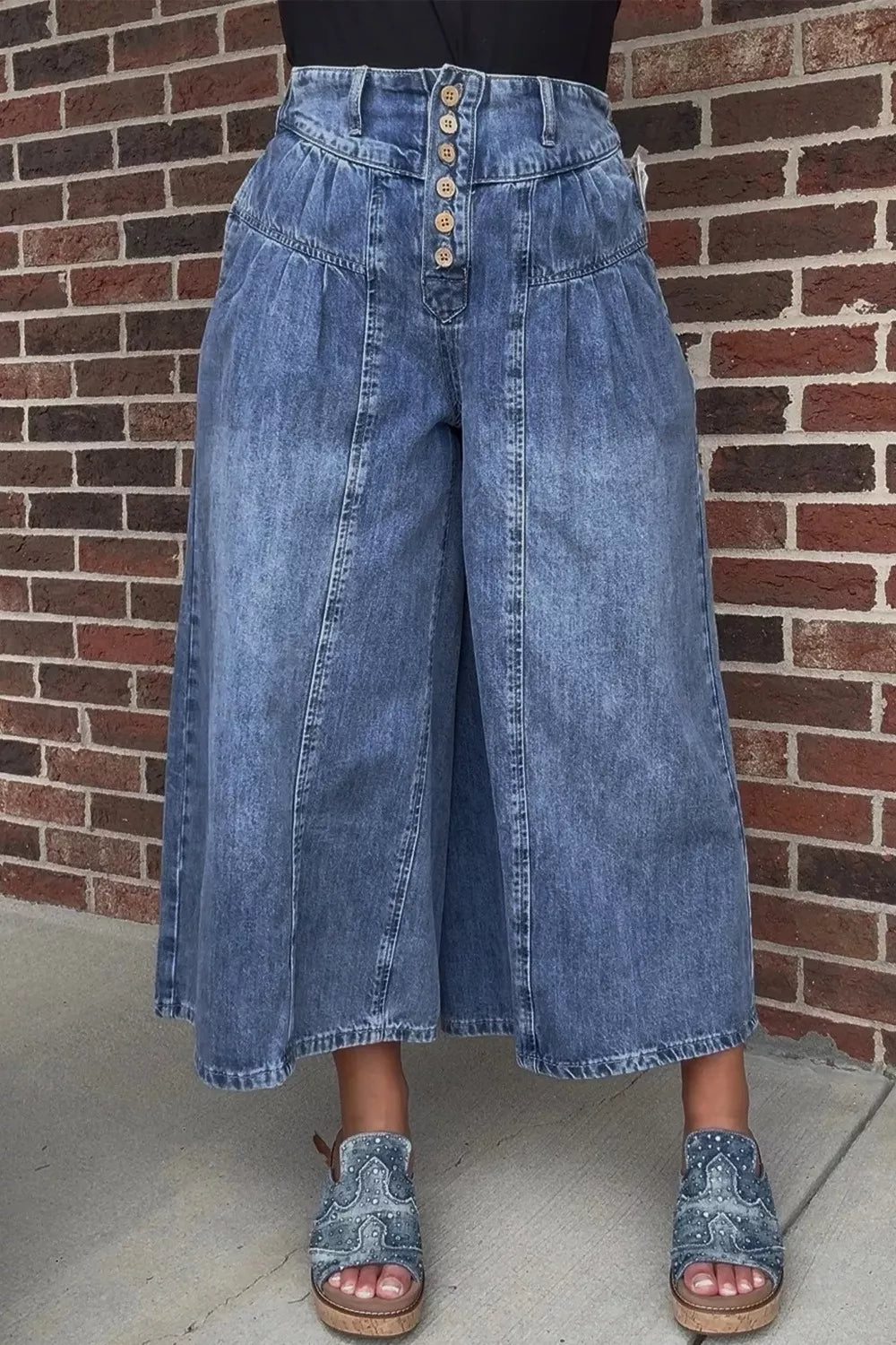 Maternity wide-leg jeans in blue denim with a button-fly and high waist.
