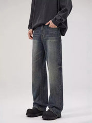 Men's relaxed fit dark wash denim jeans with a vintage look.
