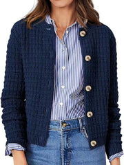 Navy textured knit button-up cardigan with round neck and wooden buttons.