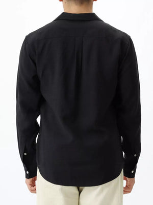 Black relaxed camp collar button-up shirt with buttoned cuffs.
