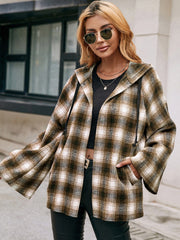 Flared sleeve hooded shacket in camel plaid with drawstring details and pockets.