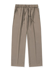 Relaxed palazzo trousers in taupe with drawstring waist and side pockets