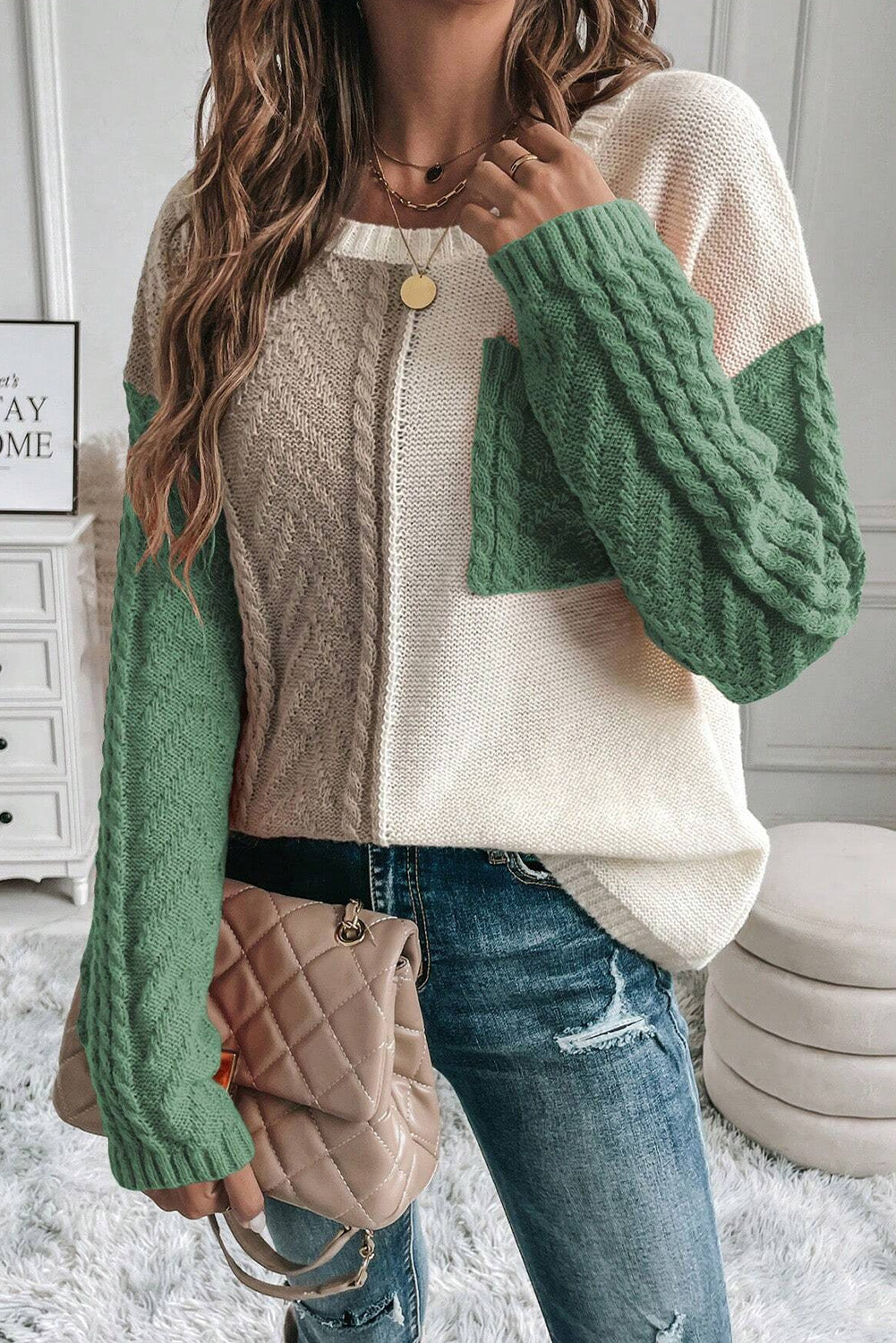 Colorblock cable knit sweater with a chest pocket in cream, tan, and gum leaf green.