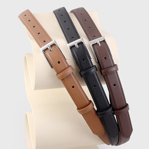 Timeless skinny leather belts in brown, black, and coffee brown with silver buckles.