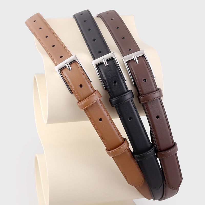 Timeless skinny leather belts in brown, black, and coffee brown with silver buckles.