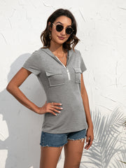 Zip-front hoodie tee in dark gray with short sleeves and two chest pockets.