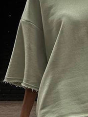 Sage raw-edge pocket tee with short sleeves and frayed cuffs