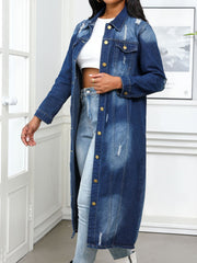 Distressed denim maxi jacket in medium wash with gold buttons and collared neckline.