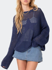 Dusty blue open knit sweater with starburst pattern, crew neck, and long sleeves.