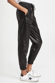 Black faux leather joggers with patch pockets and elastic cuffs.