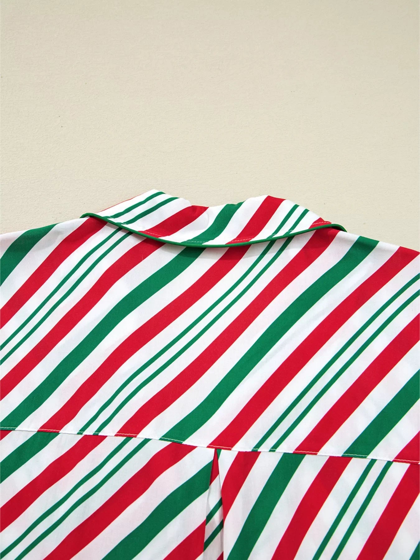 Velvet Ribbon Knot Pajama Set top with red, green, and white stripes and a green collar trim.