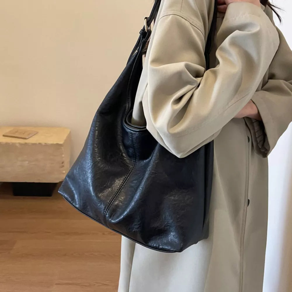 Adjustable Strap Shoulder Bag in Black, front view