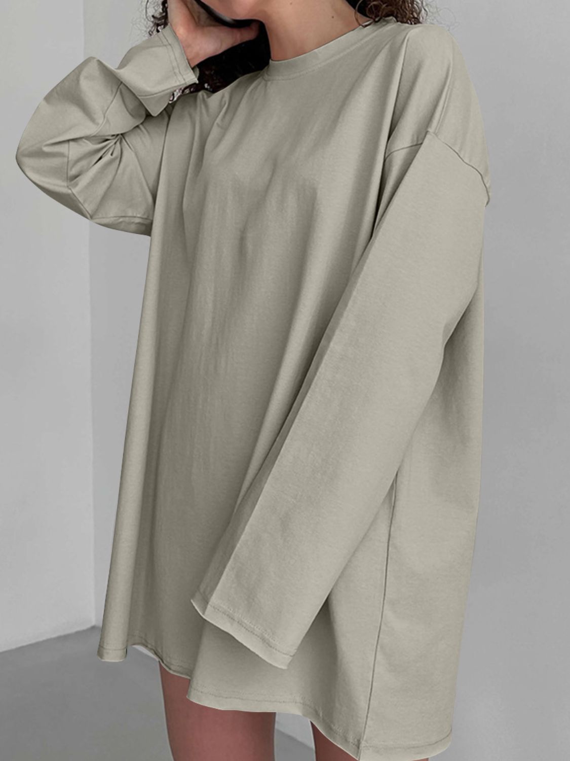 Oversized taupe cotton jersey long sleeve top with crew neck and relaxed fit.