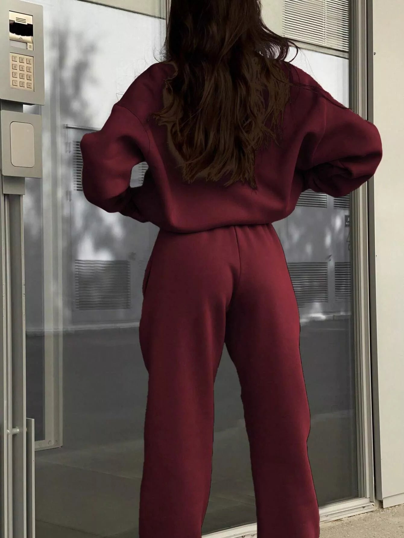 Burgundy half zip sweatshirt and matching pants set, casual athleisure outfit.