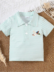 Light Green striped cotton polo shirt for baby with embroidered duck detail.