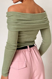 Sage ribbed knit off-the-shoulder top with draped neckline and long sleeves.