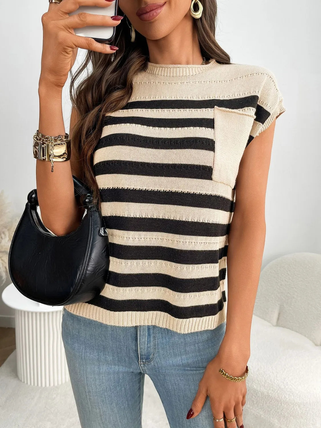 Striped knit pocket tee in beige and black with a crew neck and short sleeves.