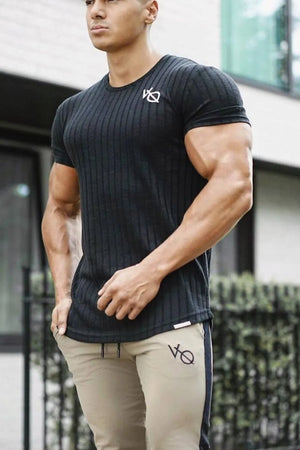 Black ribbed tee with logo detail, short sleeves, crew neck.