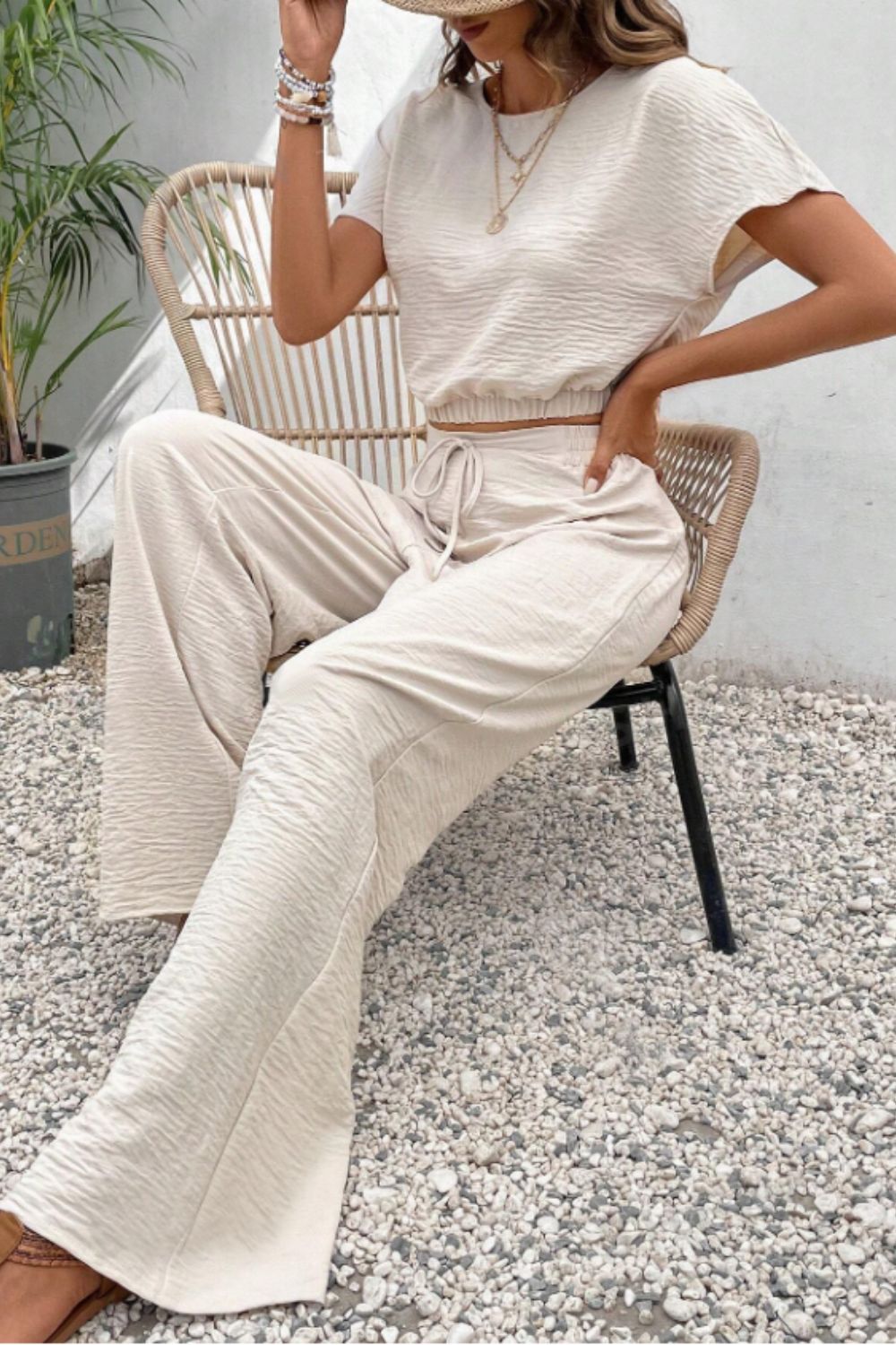 Beige textured crop top and wide-leg trousers set with drawstring waist