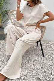 Beige textured crop top and wide-leg trousers set with drawstring waist