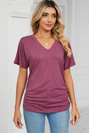 Drape-front V-neck tee in deep purple with side ruching and short dolman sleeves.