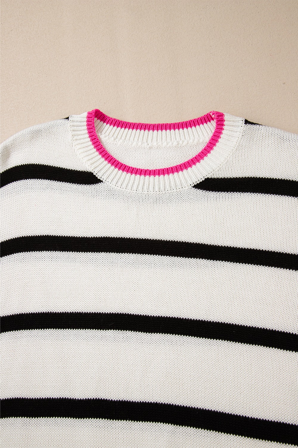 Striped knit sweater with contrast pink neckline trim