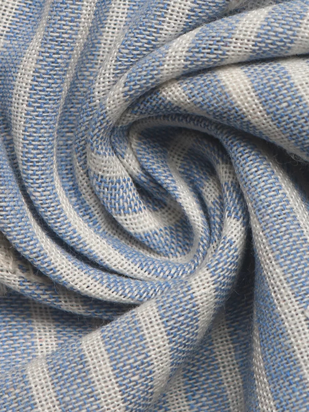 Blue and white striped peplum blouse fabric detail