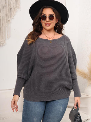 Off-shoulder ribbed knit sweater in charcoal with batwing sleeves.
