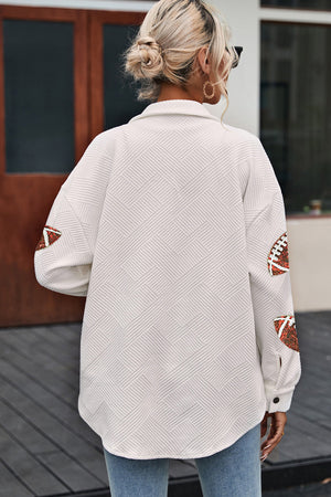 White textured overshirt with football appliqué on sleeves, casual men's style.