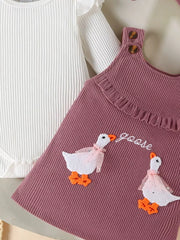 Plum purple corduroy dress with ruffle trim, goose applique, and white ribbed bodysuit with ruffle sleeves.