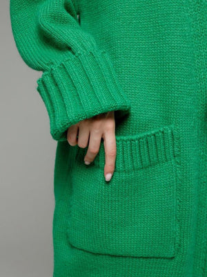 Green oversized ribbed-trim maxi cardigan with cuffed sleeves and patch pockets.