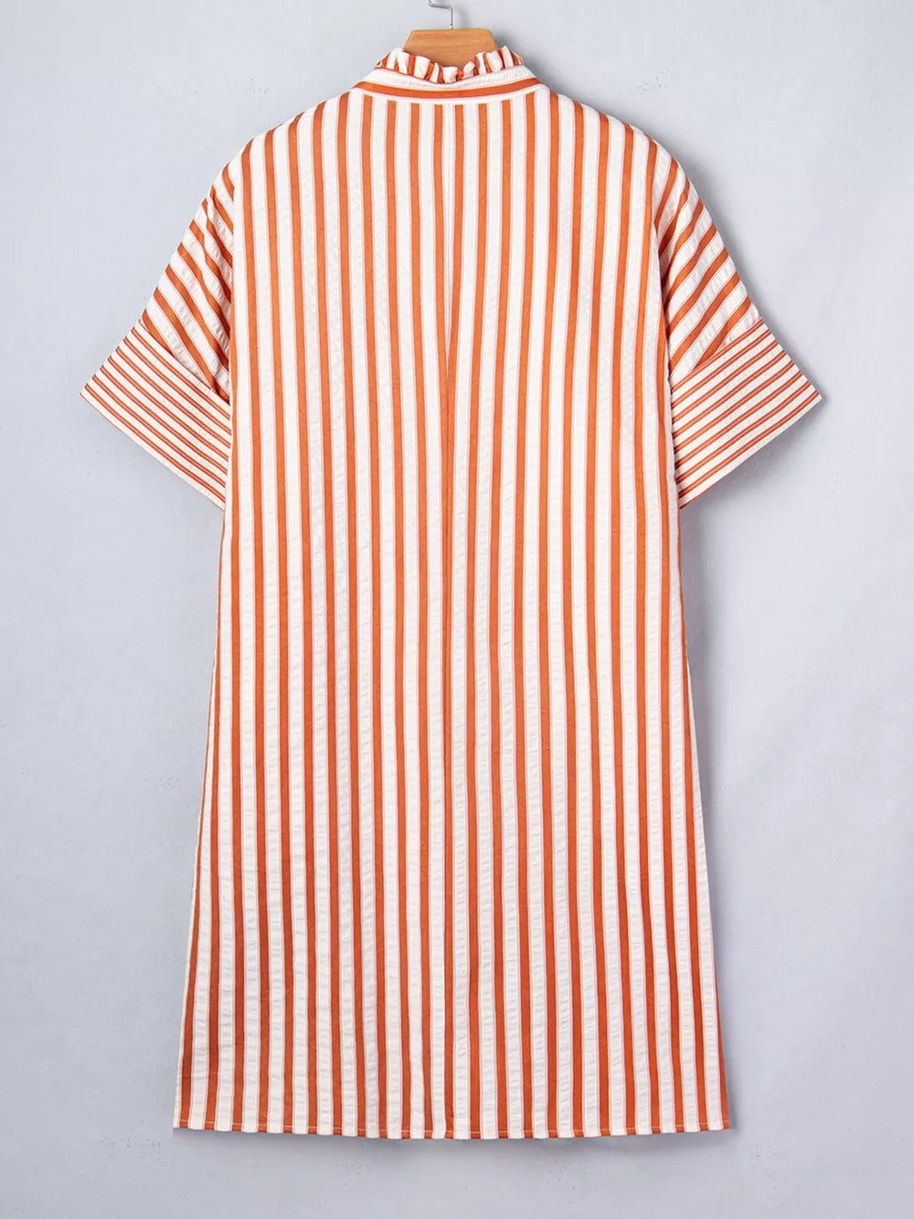Striped V-neck shift mini dress with short sleeves and a ruffled collar.