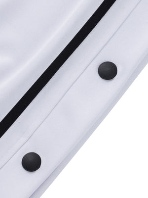 White track pants with black snap buttons and side stripe detail.