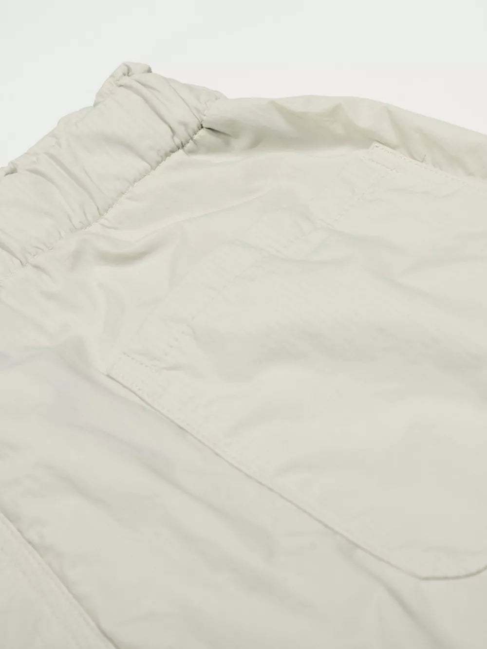 Men's gray wide-leg sweatpants with elastic waistband and pocket detail
